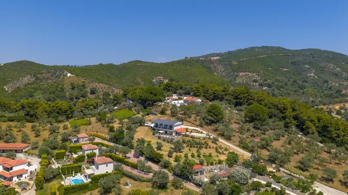 Green hills and villas around Kolios, from the air