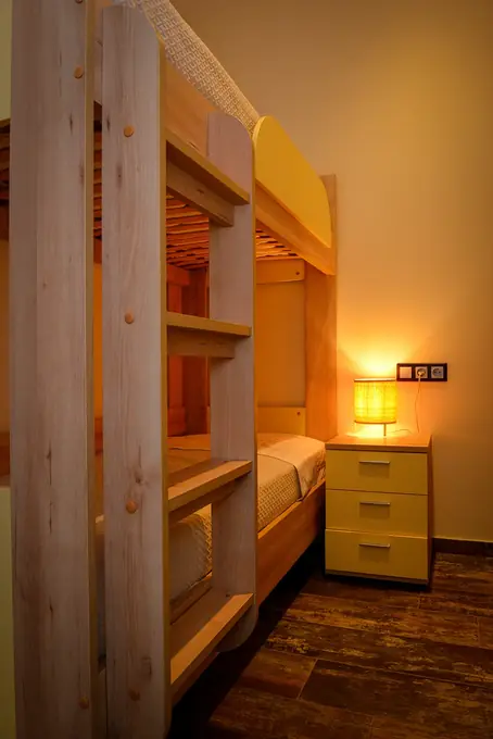 Wooden bunk beds in the second bedroom