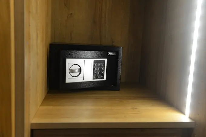 In-room safe inside the lit wardrobe