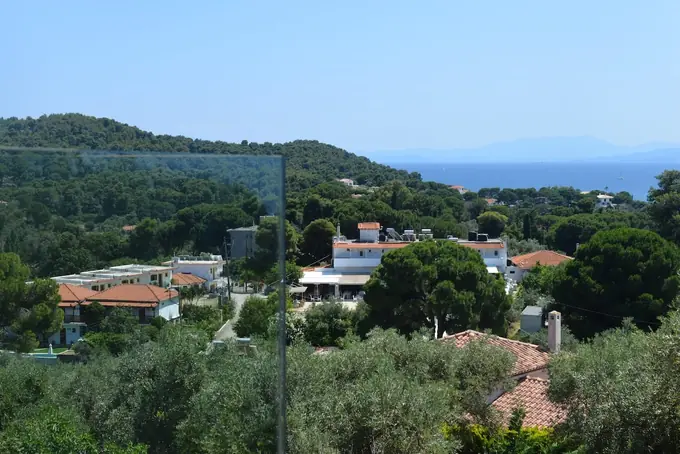 The sea view from behind the balcony glass